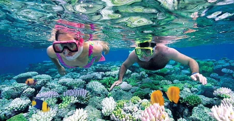 Snorkelers swimming around Prison Zanzibar